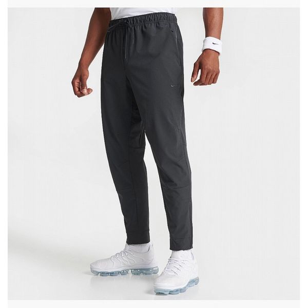 Брюки чоловічі Nike Dri-Fit Unlimited Tapered Leg (FB7548-010), 2XL, WHS, 20% - 30%, 1-2 дні